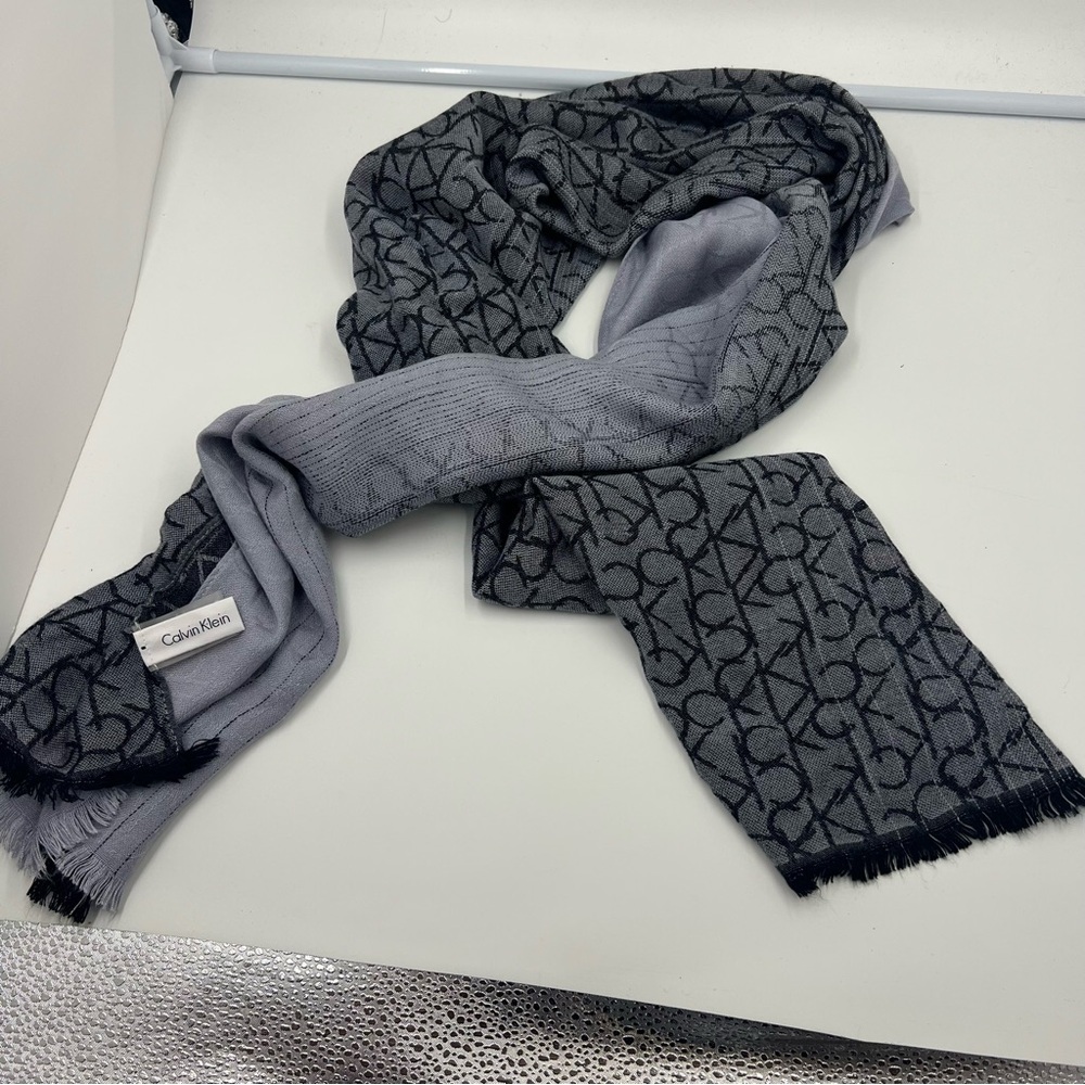 70” X 26” Calvin Klein Black and Gray Patterned Logo  Scarf